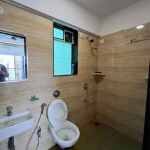 Bathroom in 2 BHK Apartment at Omkar Signet, Kasam Baug – for Rent