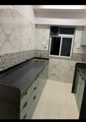 Kitchen in 3 BHK Apartment at DGS Sheetal Tapovan, Pathan Wadi – for Rent