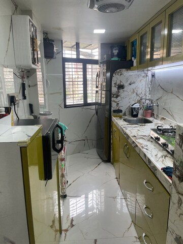 Kitchen in 2 BHK Apartment at Lalani Grandeur, Goregaon East – for Sale