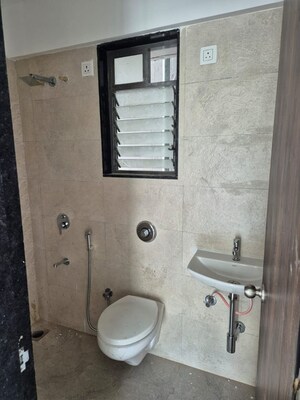Attached Bathroom in 1 BHK Apartment at UK Iridium, Kandivali East – for Rent