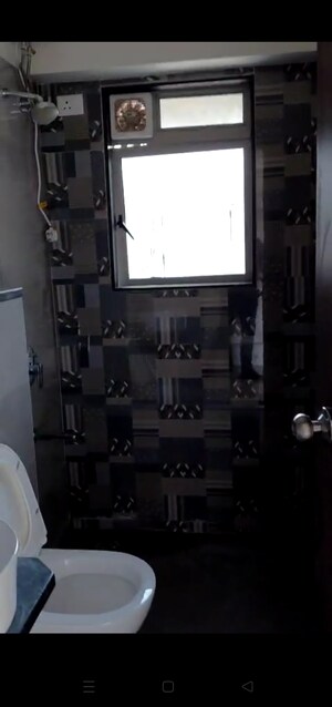 Bathroom in 2 BHK Apartment at Veena Smart Homes, Kandivali West – for Rent