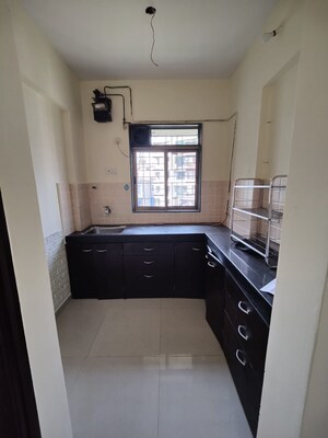 Kitchen in 1 BHK Apartment at Mahavir Square, Manpada – for Rent