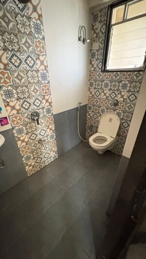 Bathroom in 2 BHK Apartment at Puranik City Phase II, Ghodbunder Road – for Rent
