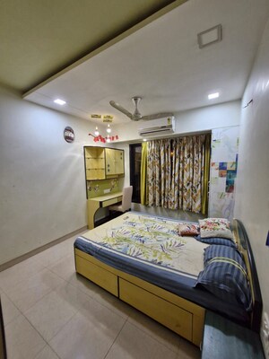 Bedroom in 3 BHK Apartment at Lalani Grandeur, Goregaon East – for Sale