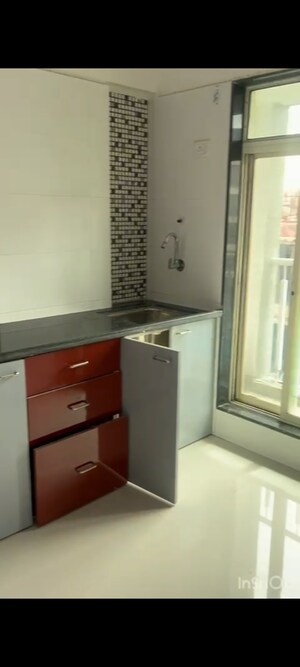 Kitchen in 1 BHK Apartment at Ramdev Park, Mira Road – for Sale
