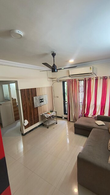 Living Room in 1 BHK Apartment at Manavsthal Heights, Andheri East – for Rent