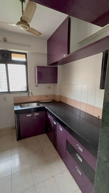 Kitchen in 1 BHK Apartment at Cosmos Orchid, Ghodbunder Road – for Rent
