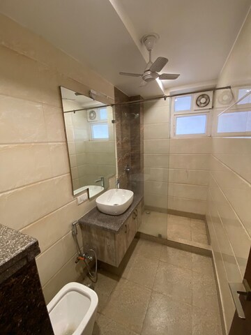 Bathroom in 4 BHK Builder Floor at Ansal Sushant Lok I, Sector 43 – for Rent