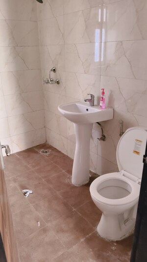 Bathroom in 3 BHK Apartment at Samridhi Luxuriya Avenue, Sector 150 – for Rent