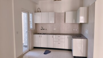 Kitchen in 3 BHK Apartment at Samridhi Luxuriya Avenue, Sector 150 – for Rent