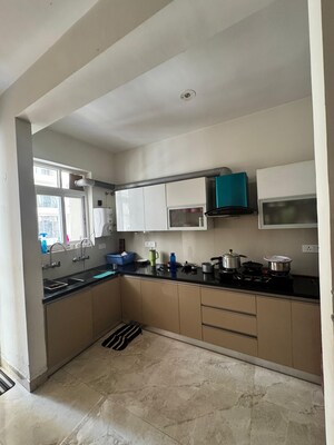 Kitchen in 2 BHK Apartment at Artique Uptown Skylla, International Airport Road – for Rent