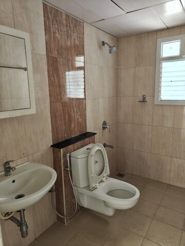 Bathroom in 3 BHK Apartment at Mantri Webcity, Hennur – for Rent