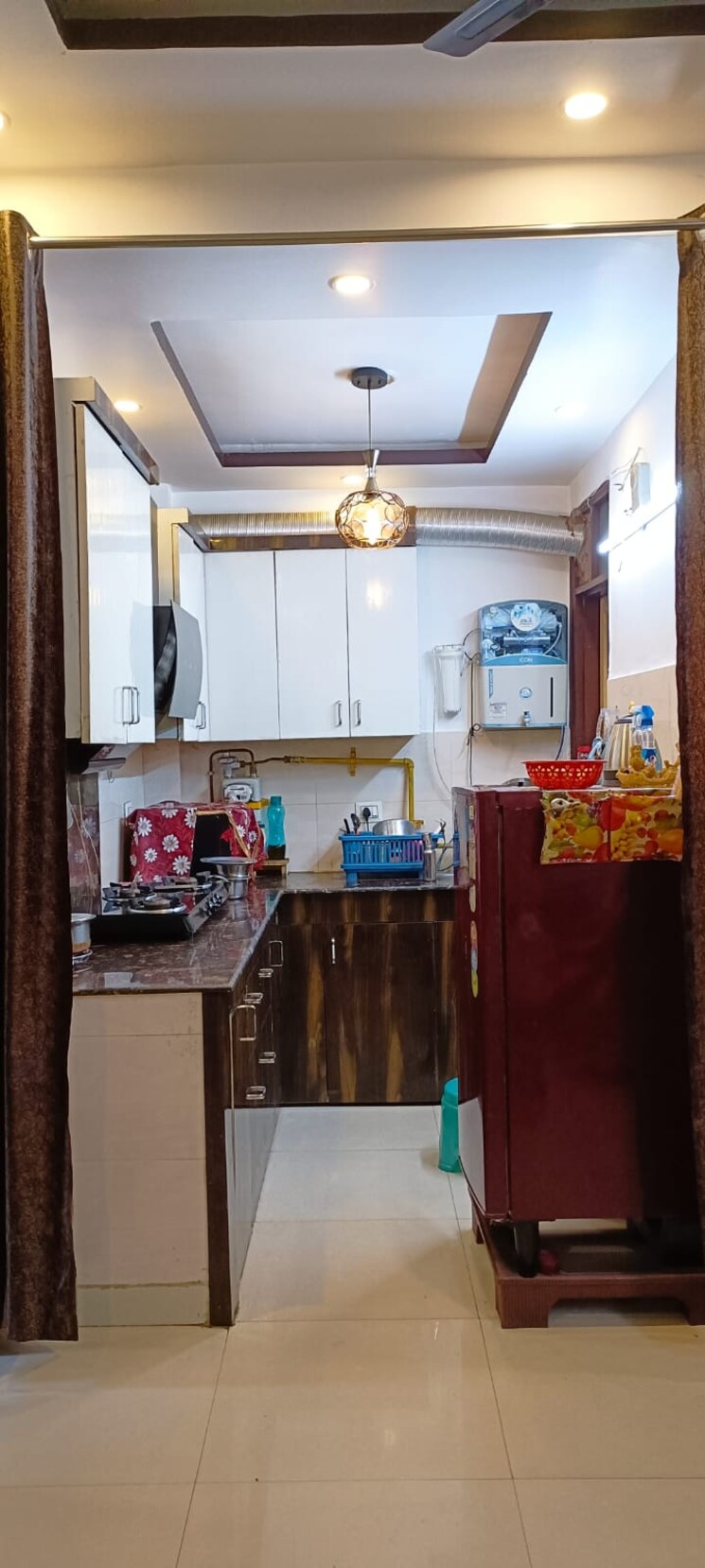 Kitchen, mohan garden 2 Bedroom 60 Sq.Yd. Builder Floor In Mohan Garden Delhi 9239103