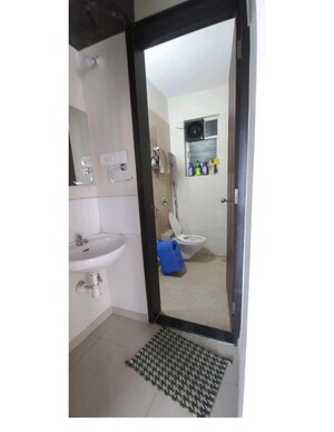 Bathroom in 2 BHK Apartment at Mantra Moments, Moshi – for Rent