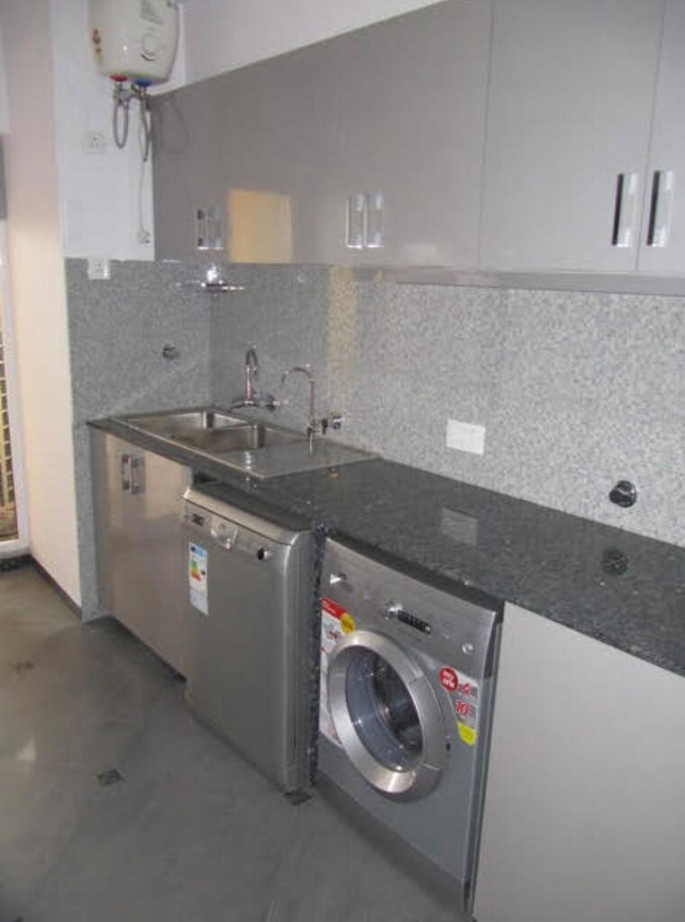 Kitchen, unitech-heritage-city 3.5 Bedroom 1905 Sq.Ft. Apartment In Sector 25 Gurgaon 9239198