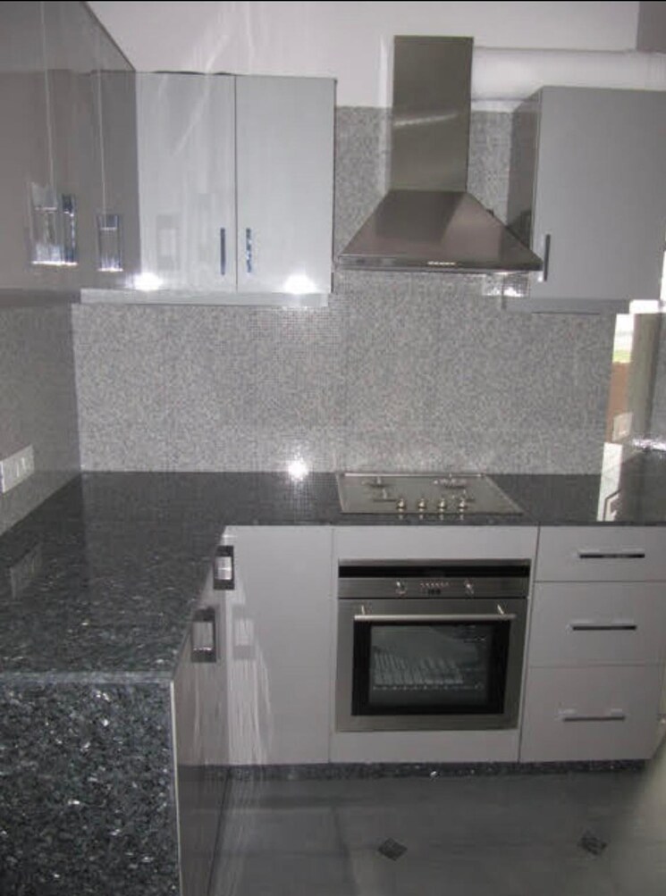 Kitchen, unitech-heritage-city 3.5 Bedroom 1905 Sq.Ft. Apartment In Sector 25 Gurgaon 9239198