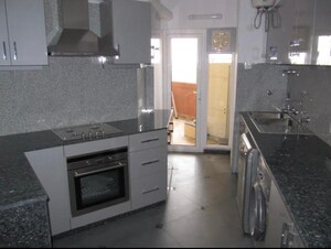 Kitchen in 3.5 BHK Apartment at Unitech Heritage City, Sector 25 – for Rent