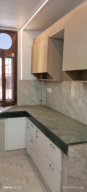 Kitchen in 1.5 BHK Builder Floor at Shalimar Garden – for Sale