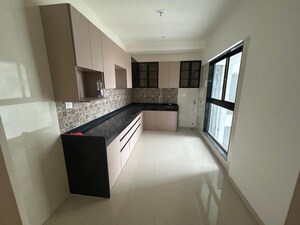 Kitchen in 4 BHK Apartment at Rajesh Raj Infinia, Malad West – for Rent