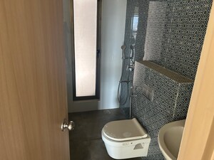 Bathroom in 4 BHK Apartment at Rajesh Raj Infinia, Malad West – for Rent