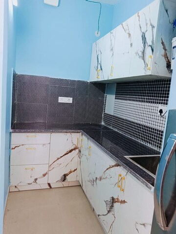 Kitchen in 1.5 BHK Builder Floor at Sector 56 – for Rent