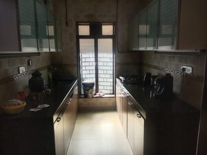 Kitchen in 2 BHK Apartment at Group Seven Rushi Heights, Goregaon East – for Rent