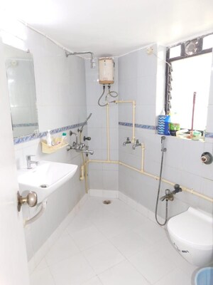 Bathroom in 2 BHK Apartment at Versova Denzil CHS, Andheri West – for Rent