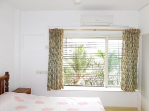Bedroom in 2 BHK Apartment at Versova Denzil CHS, Andheri West – for Rent