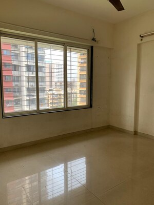 Room in 2 BHK Apartment at Amar Jyoti Tower, Borivali West – for Sale