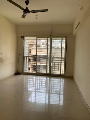 Room in 2 BHK Apartment at Amar Jyoti Tower, Borivali West – for Sale