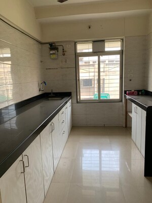Kitchen in 2 BHK Apartment at Amar Jyoti Tower, Borivali West – for Sale