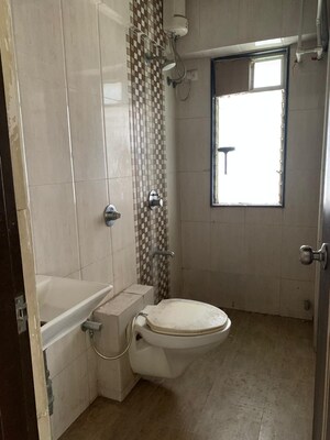 Bathroom in 2 BHK Apartment at Amar Jyoti Tower, Borivali West – for Sale