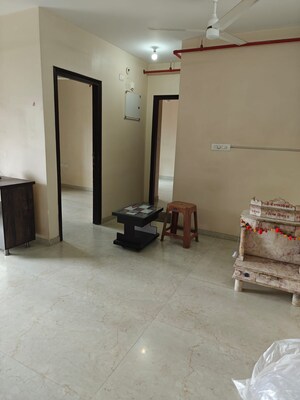 Living Room in 1 BHK Apartment at Yashraj Park CHS, Kasarvadavali – for Rent
