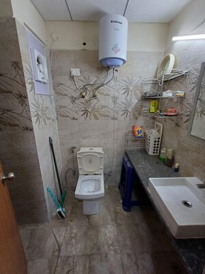 Bathroom in 1 BHK Apartment at Paramount Golfforeste, Zeta I Greater Noida – for Rent