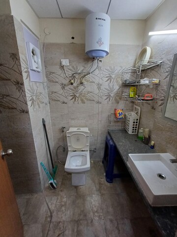 Bathroom in 1 BHK Apartment at Paramount Golfforeste, Zeta I Greater Noida – for Rent
