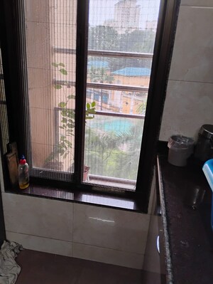 Kitchen in 2 BHK Apartment at Madhav Palacia, Ghodbunder Road – for Rent