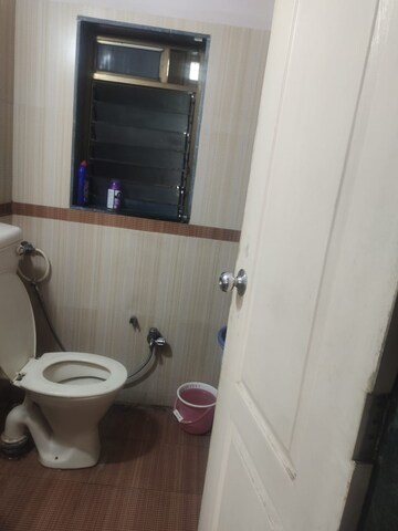 Bathroom in 1 BHK Apartment at Lalani Residency, Kavesar – for Rent