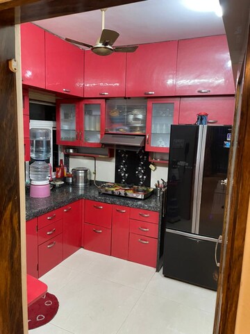 Kitchen in 2 BHK Apartment at Lalani Residency, Kavesar – for Rent