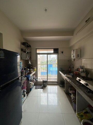 Kitchen in 1 BHK Apartment at Cosmos Jewels, Ghodbunder Road – for Rent