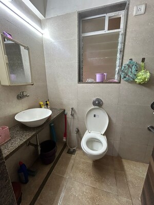 Bathroom in 1 BHK Apartment at Cosmos Jewels, Ghodbunder Road – for Rent