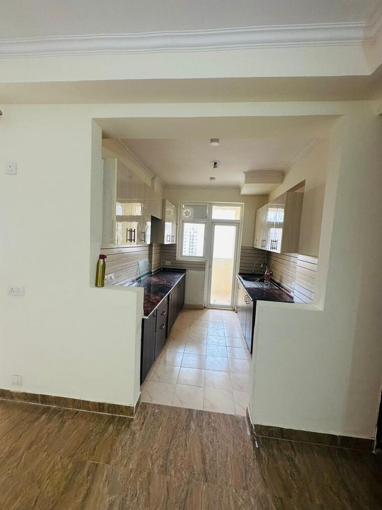 Kitchen, eldeco-live-by-the-greens 2 Bedroom 1155 Sq.Ft. Apartment In Sector 150 Noida 9239912