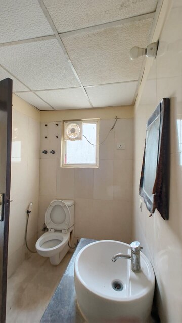 Bathroom in 3 BHK Apartment at Paramount Symphony, Sain Vihar – for Sale