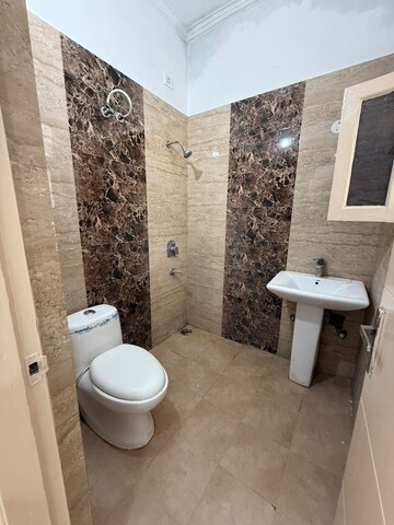 Attached Bathroom in 3 BHK Builder Floor at Dhakoli – for Sale
