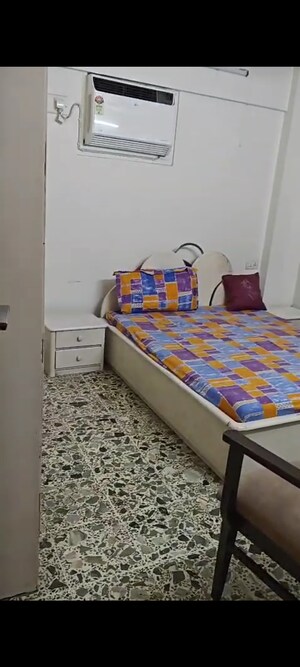 Bedroom in 2 BHK Apartment at Royal Palace, Andheri West – for Rent