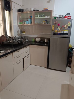 Kitchen in 2 BHK Builder Floor at Rajyog Township, Sinhagad Road – for Sale