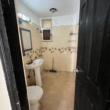 Bathroom in 3 BHK Apartment at Amrapali Zodiac, Sector 120 – for Sale