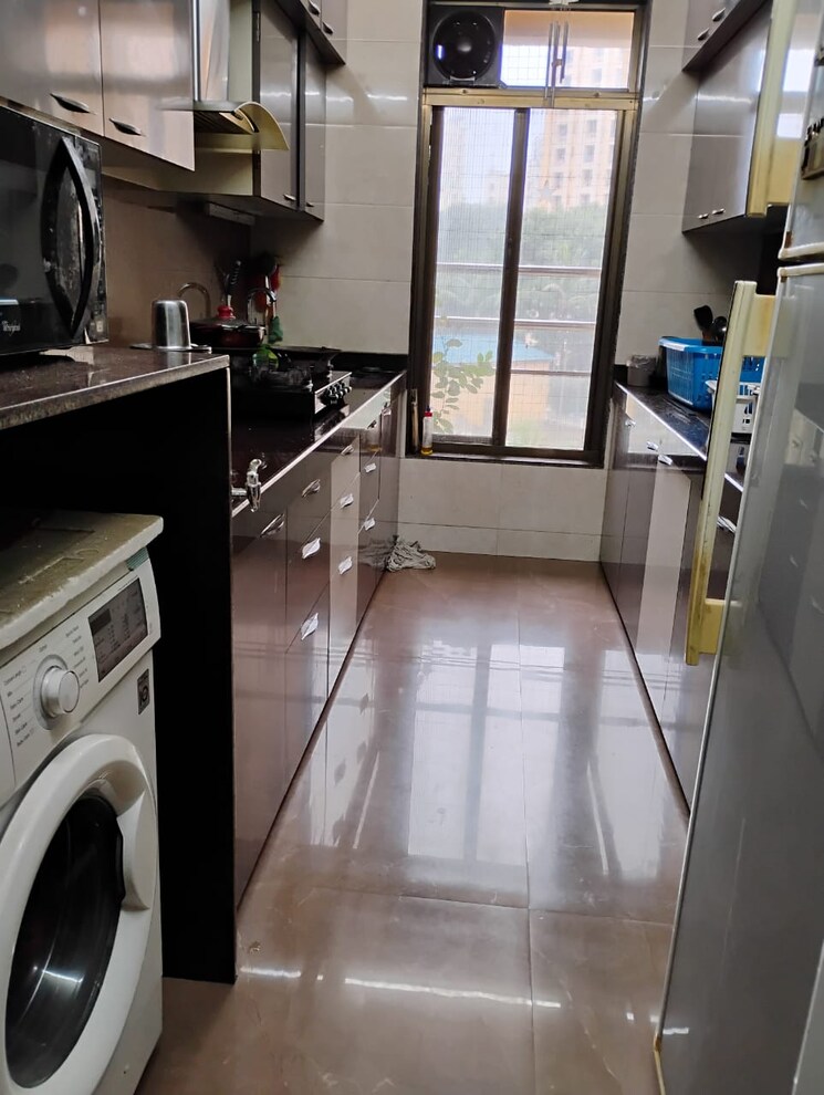 Kitchen, godrej-emerald 3 Bedroom 900 Sq.Ft. Apartment In Ghodbunder Road Thane 9240094