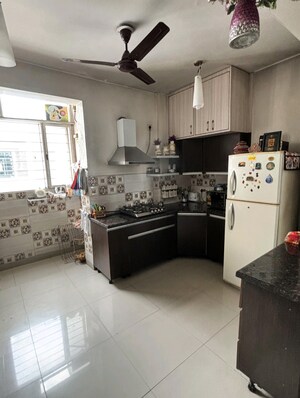 Kitchen in 2.5 BHK Apartment at ABA Olive County, Vasundhara Sector 5 – for Sale