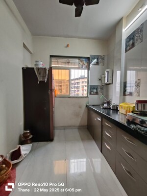 Kitchen in 1 BHK Apartment at Vighnahar CHS, Kharigaon – for Rent