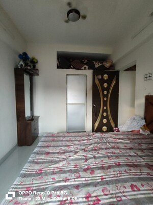 Bedroom in 1 BHK Apartment at Vighnahar CHS, Kharigaon – for Rent